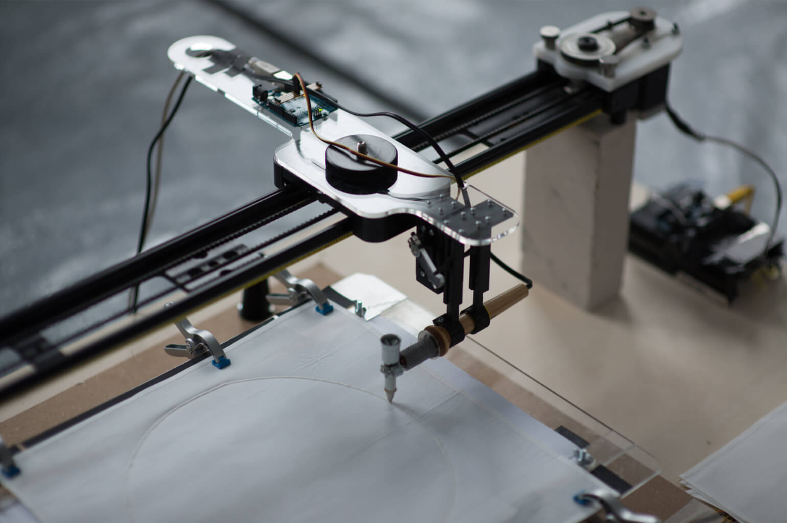 The beeswax printer was assembled using a repurposed X-Y plotter mechanism, a batik wax pen and 3D printed parts.